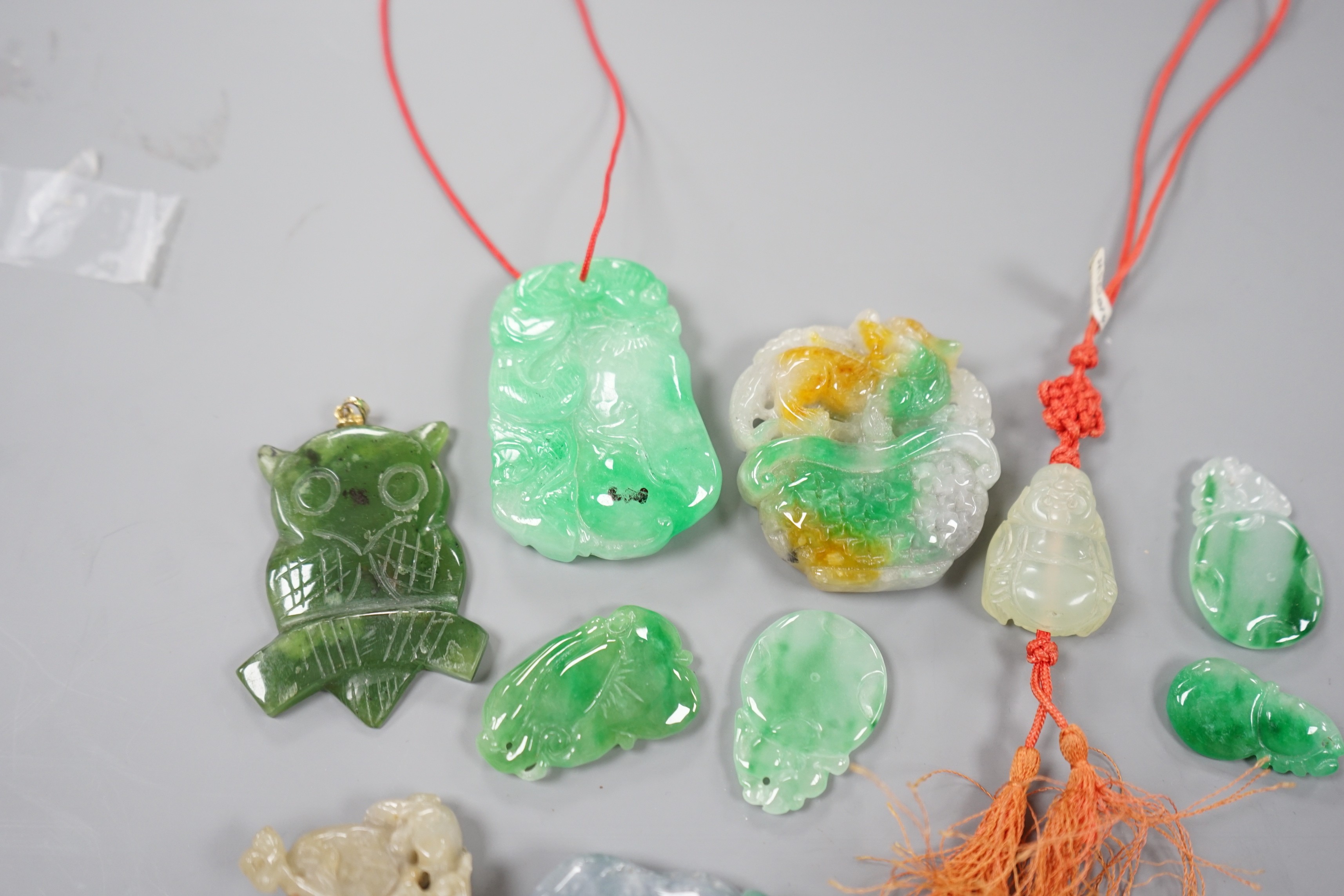 A group of ten jadeite and hardstone carvings and pendants